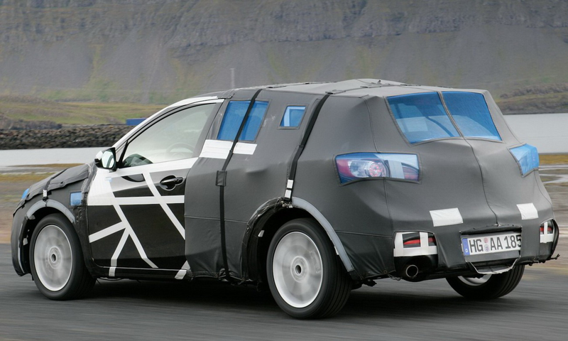 Illustration for article titled 2010 Mazda3 Hatchback Spied By Mazda